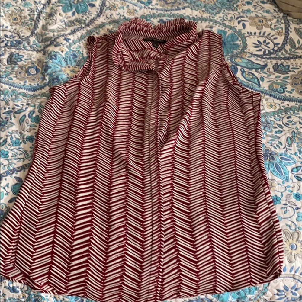 Red and white chevron patterned sleeveless blouse